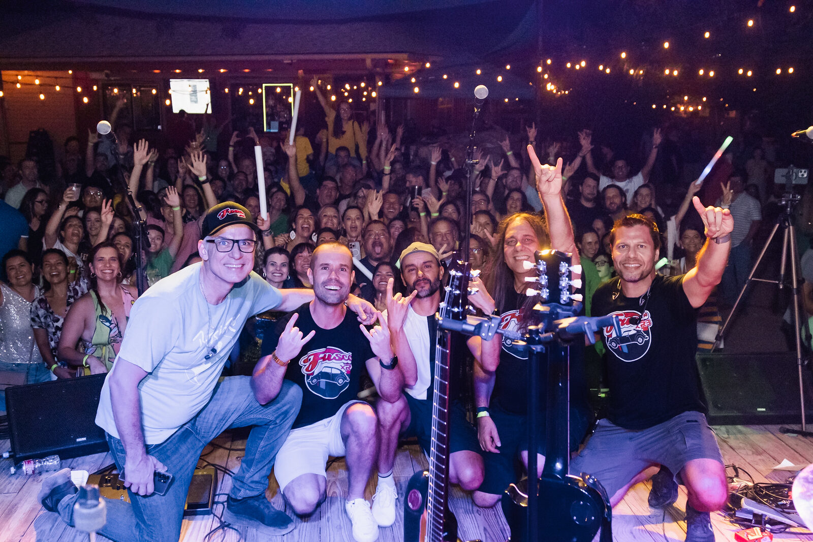 A huge Brazilian community crowd celebrating with the band on stage at Brazil Day ATX in Austin